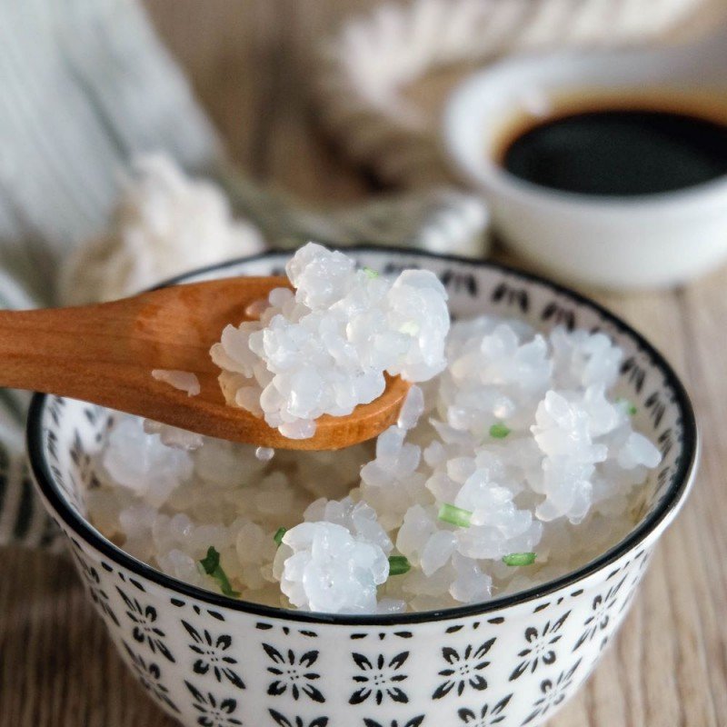 A close-up of translucent konjac rice, a low-calorie, gluten-free alternative to traditional rice, packed with health benefits of konjac.