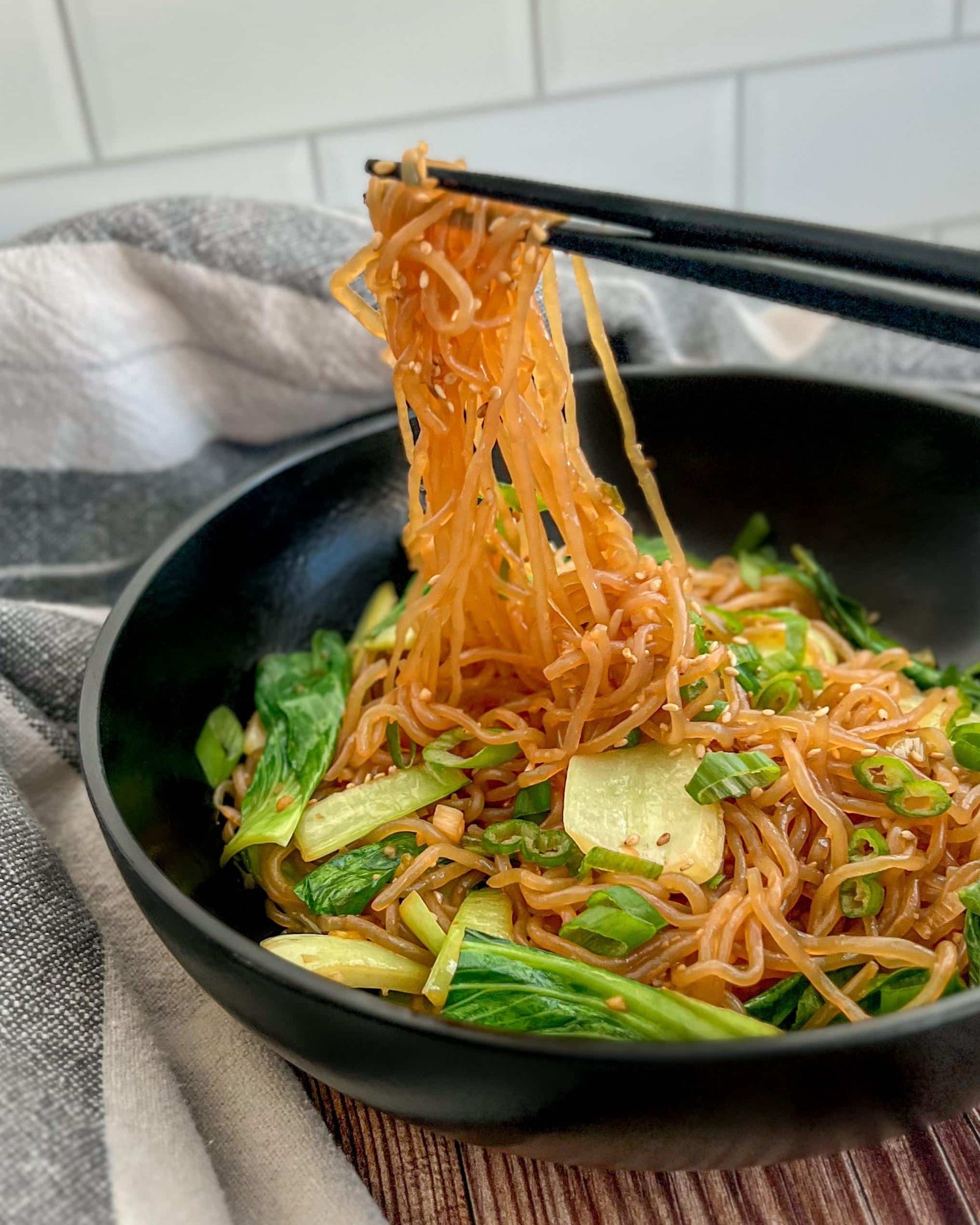 Delicious and healthy stir-fried shirataki noodles with vibrant vegetables - a perfect low-carb, gluten-free meal with amazing health benefits of konjac.